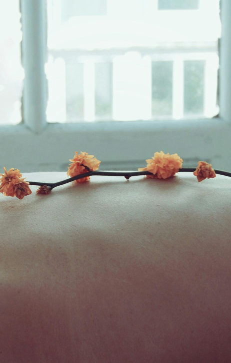 Woman getting her back massaged